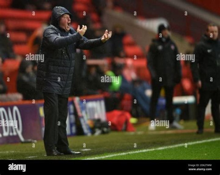 AFC Wimbledon boss Wally Downes watched Match of the Day 'giggling' as West Ham held their heads in hands