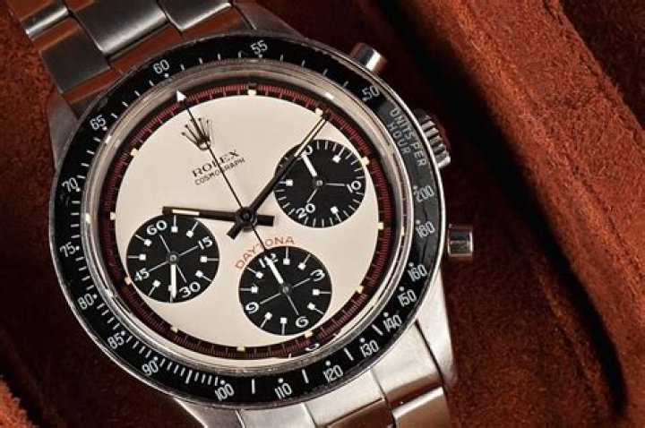 An iconic Rolex watch worn by Paul Newman in 1960s racing movie just sold for a record £13MILLION