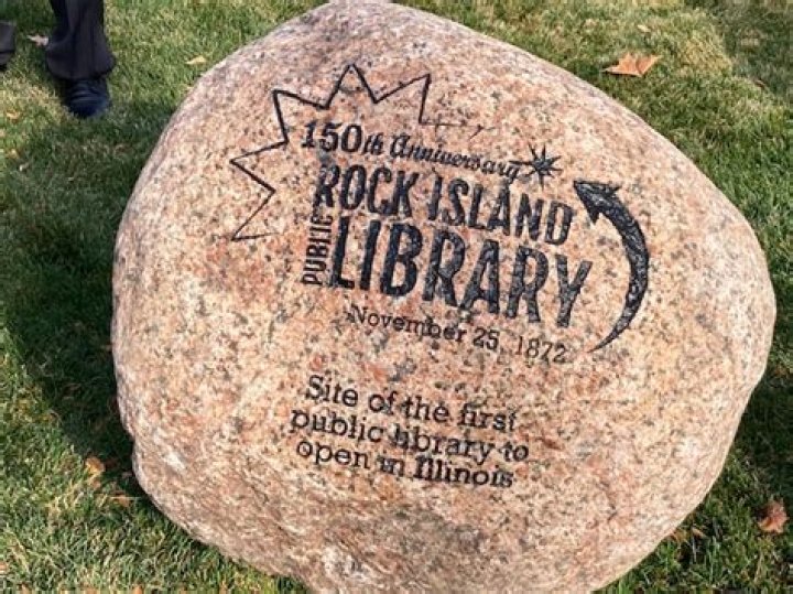 Big QC library birthday rocks with big new rock