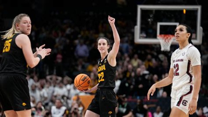 Caitlin Clark upended by fan storming court after Hawkeyes upset