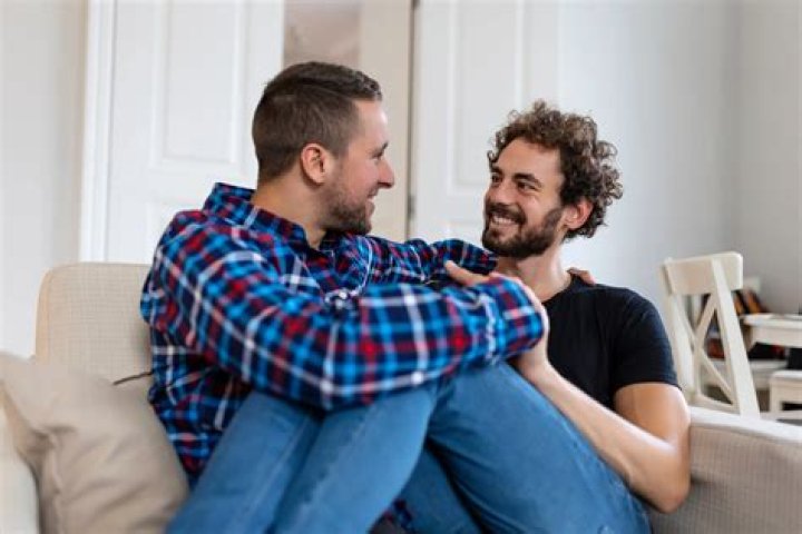 Carers kissing and cuddling CH residents