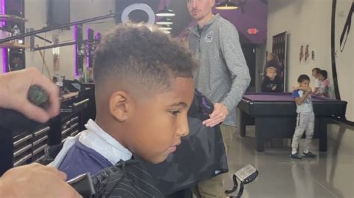 ‘Cuts for Confidence’: Moline Barbershop gives free haircuts and backpacks to kids heading to school