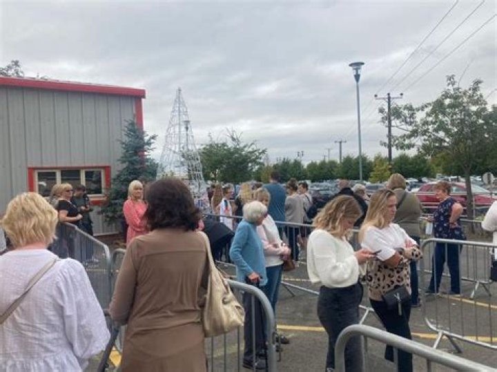 Families form massive queues to meet Father Christmas in SEPTEMBER with garden centre forced to build metal barriers