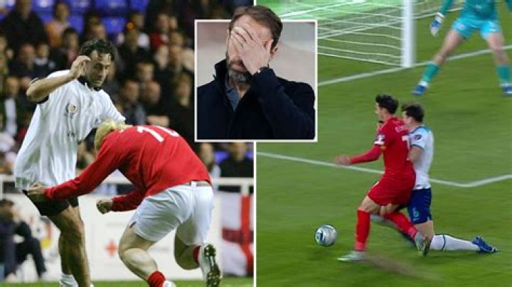 Fans compare Harry Maguire to BoJo after escaping punishment for 'rugby tackle' in England's draw with North Macedonia