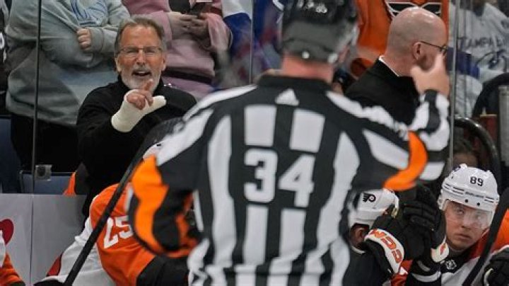 Flyers coach John Tortorella reluctantly leaves bench after being tossed in game against Lightning