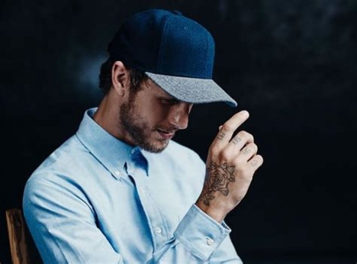 Head To Head: Is It Ever OK For A Man To Wear A Baseball Cap?