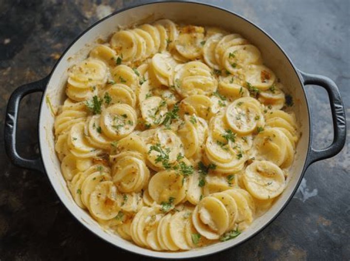 How do you make Paula Deen’s scalloped potatoes?