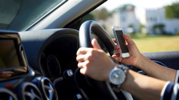 How touching your phone while driving could send your insurance bill soaring by hundreds of pounds each year