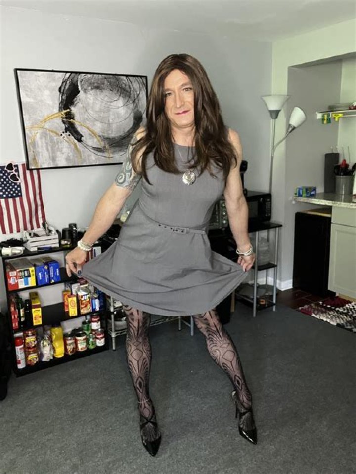 I enjoy wearing stockings, suspenders and strap-on breasts for my wife - am I a cross-dresser?