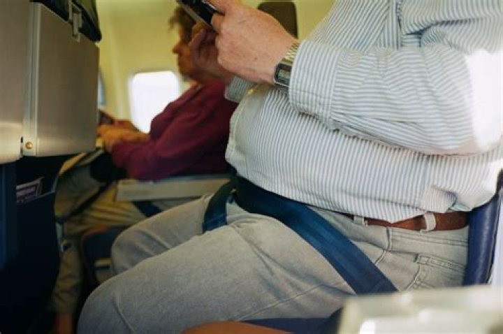 I was kicked off flight for 'fat shaming' obese man who took up a good chunk of my seat - am I a bad person?