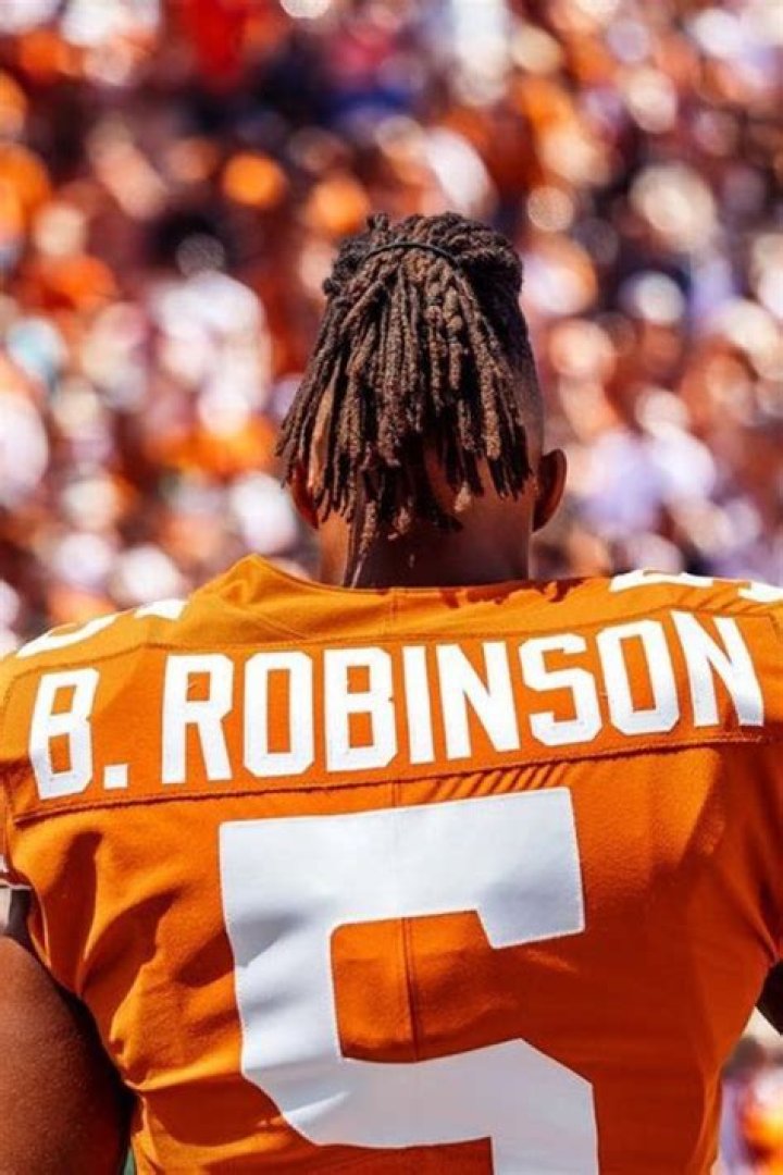 Is Bijan Robinson Hair Real? Long Hairstyle Of The NFL Draft