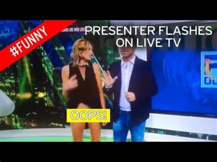 Italian news presenter Barbara Francesca Ovieni accidentally flashes her underwear on live TV