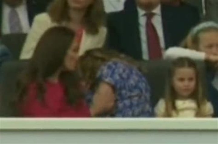 Kate Middleton shows off her mothering instinct, giving Mia Tindall a cuddle and cheering her up during Jubilee pageant
