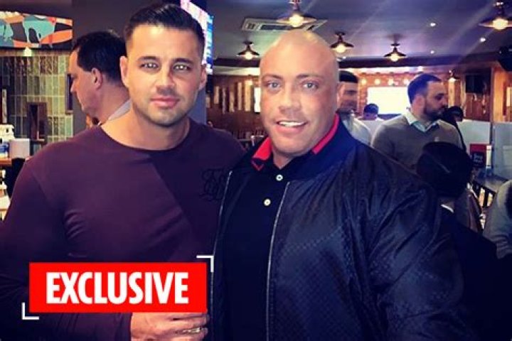 Katie Price’s boyfriend Carl Woods poses with drugs-gang leader pal after he’s released from prison