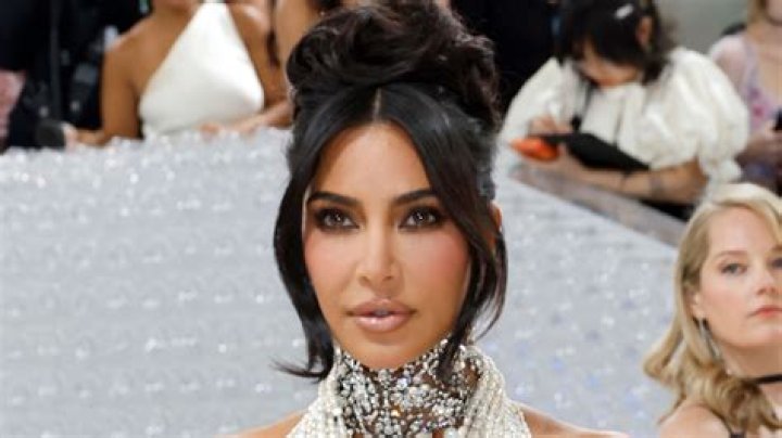 Kim Kardashian goes topless under pearl necklace at Met Gala- and fans think racy look is nod to her 2007 Playboy shoot