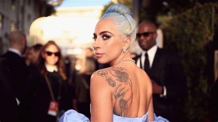 Lady Gaga shows off her tattoos as she poses NUDE for British Vogue