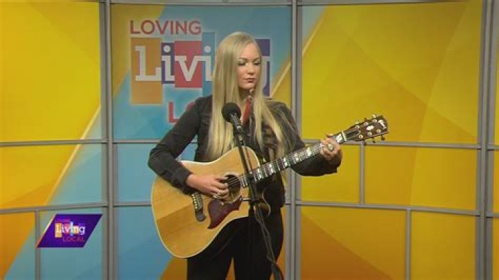 Local country artist Angela Meyer performs song dedicated to veterans