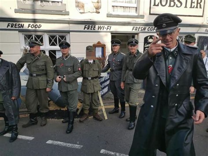 Men dressed as Nazi SS clash with furious locals as cops escort them off high street during Sheringham 1940s weekend