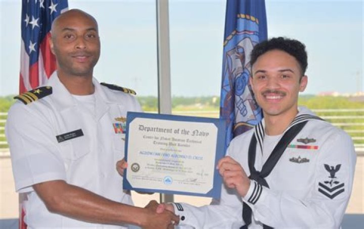 Moline native completes aerographer’s mate coursework, reenlists in U.S. Navy