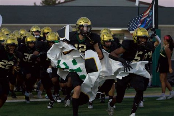 Muscatine Football rolls to a big win