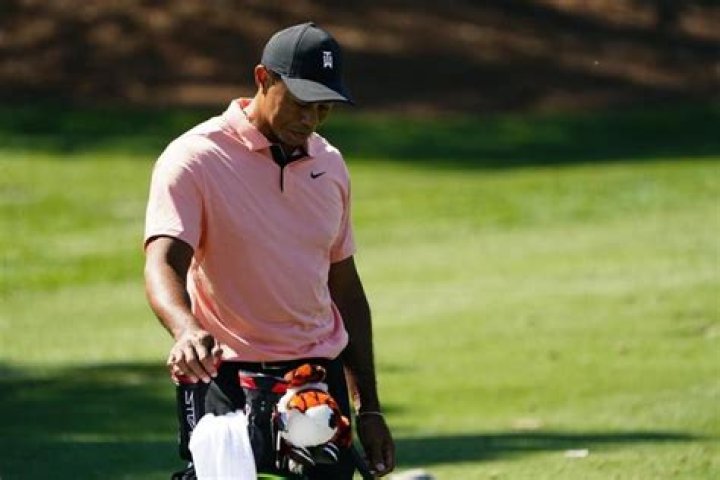 On the prowl? Tiger arrives at Masters, unsure of playing