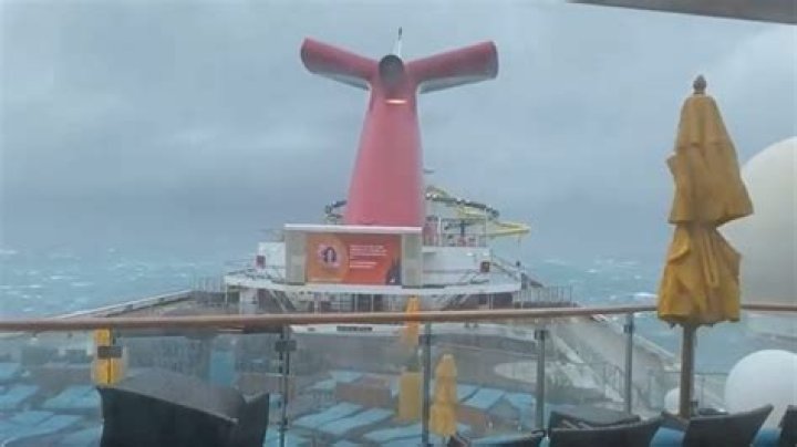 Pool waves crash as Carnival cruise ship heads back to port on rough seas