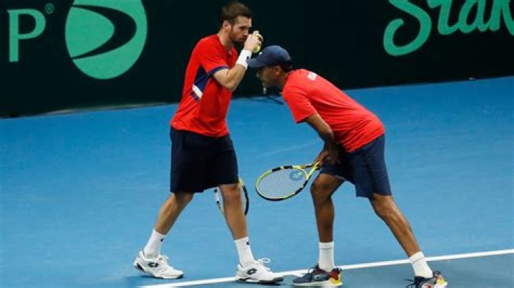 Rajeev Ram and Austin Krajicek win in doubles to lead the US past Ukraine in the Davis Cup