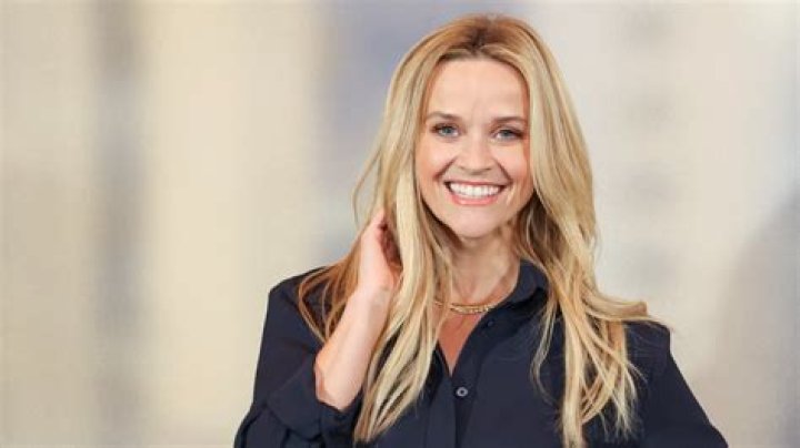 Reese Witherspoon, 42, bares her underboob in a bikini as she lounges in the sun on holiday in Mexico