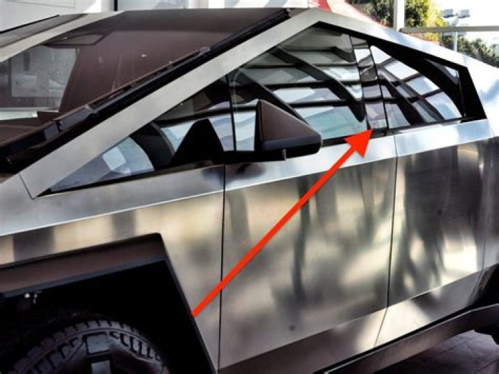 The Cybertruck's lack of door handles confused its first buyers — leading Elon Musk to show them how to open the truck