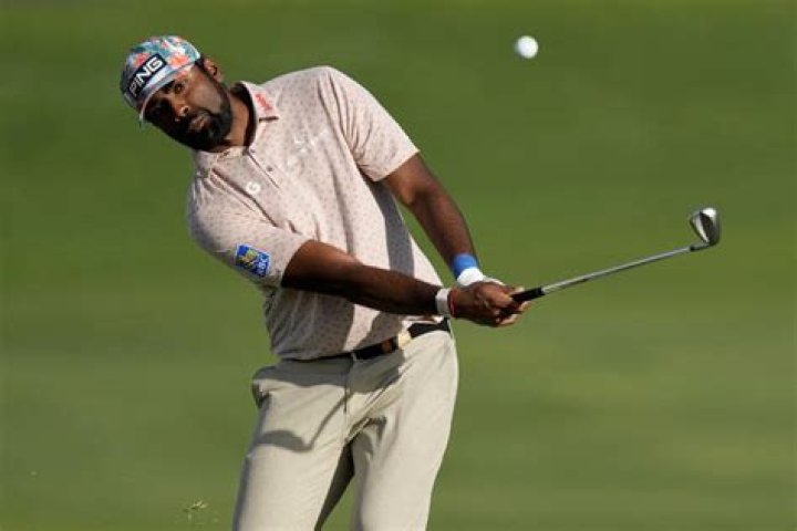 Theegala leads season opener at Kapalua with 64. Morikawa hits opening tee shot packed with emotion