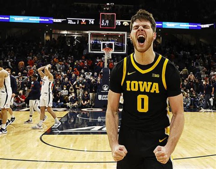 Toussaint jumper lifts Iowa past Virginia in thriller, 75-74