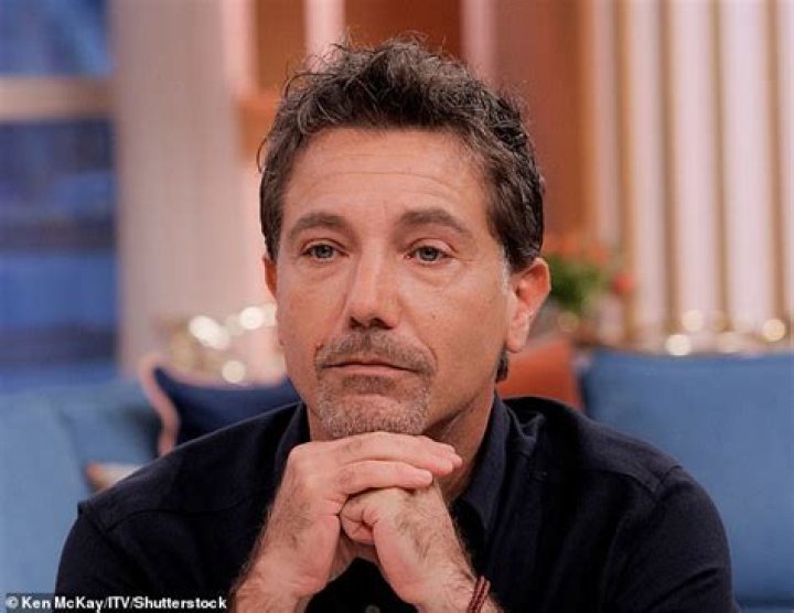 When did Gino D’Acampo burgle Paul Young's house?