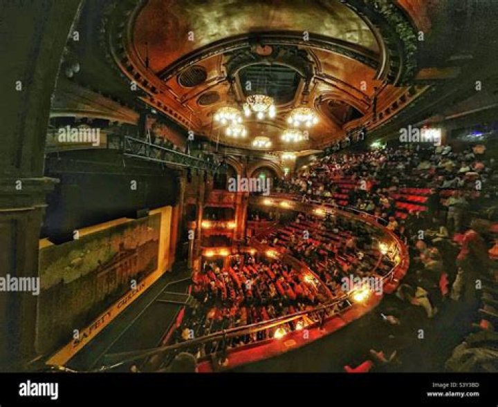 Where is the London Palladium, how old is the theatre, who designed it and who has performed there over the years?