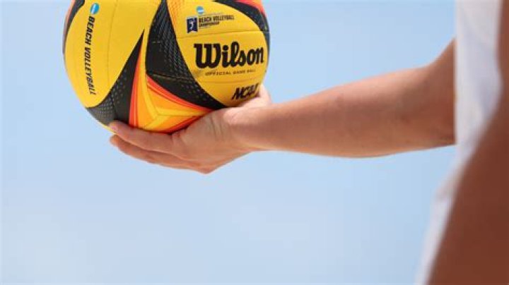 World's sexiest volleyball star Kayla Simmons goes topless on the beach and shows off her bum sending fans wild